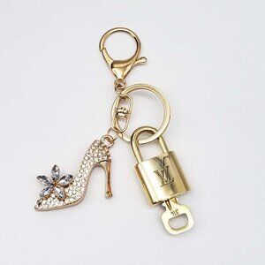 100% Auth Louis Vuitton Lock & Key with unbranded Bagcharm, Keycharm, Keychain